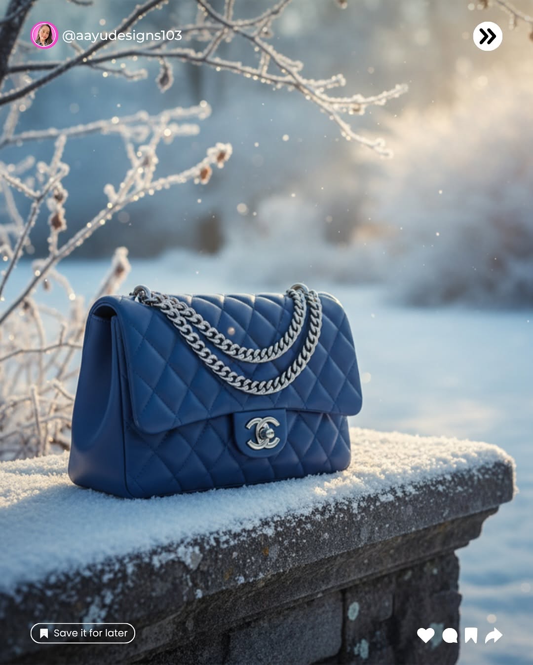 A blue luxury bag on a snowy stone ledge